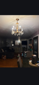 A beautiful chandelier installed in a living room by J Turner Electric LLC in Indianapolis, IN.