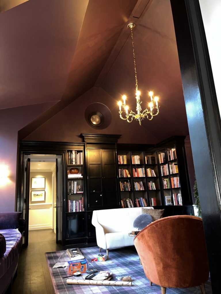Elegant chandelier installed in a living room or library by T.S.F Electric in Saco, ME.