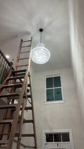 A ladder positioned for chandelier installation or maintenance by Geter Electrical Services LLC in Fountain Inn, SC.