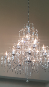 A large, ornate chandelier installed by Zaheer Electrical Plus in Dallas, TX.