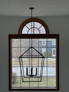 Elegant chandelier lighting fixture installed in a home by Breakers Electric LLC in Dover, NH.