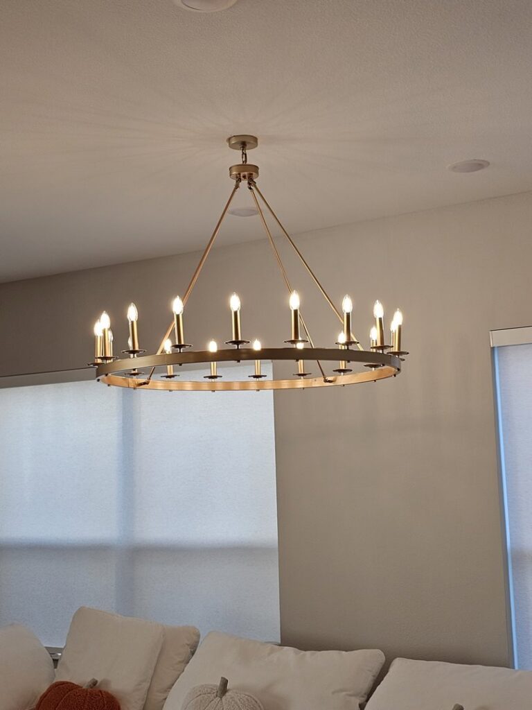 A decorative chandelier light fixture installed on a ceiling by Tesla Alarm and Electrical in Plano, TX
