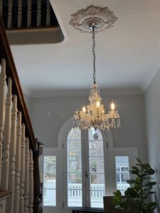 A beautiful chandelier lighting fixture installed in a home foyer by The Wire Guy in San Jose, CA.