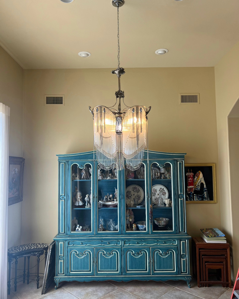 A chandelier and recessed lighting installed in a room by Silo Electric in Gilbert, AZ