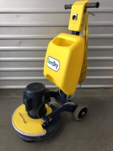 A yellow Chem-Dry carpet cleaning buffer machine, part of the professional equipment used by Sunrise Chem-Dry in Glendale, AZ.