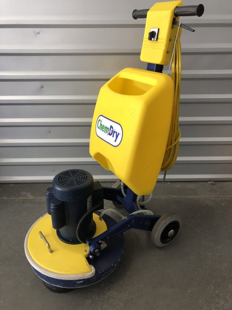 A yellow Chem-Dry carpet cleaning buffer machine, part of the professional equipment used by Sunrise Chem-Dry in Glendale, AZ.
