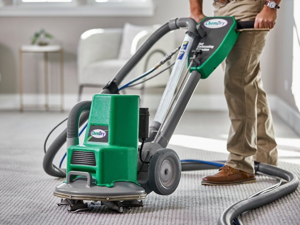 A Chem-Dry of Sioux Falls technician operating a carpet cleaning machine on a residential carpet in Sioux Falls, SD.