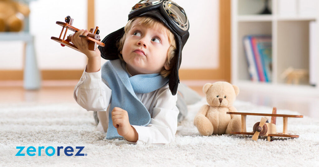 A child playing on a freshly cleaned, light-colored carpet by Zerorez Columbia in Columbia, SC.