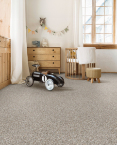 A cozy child's room featuring light beige speckled carpet installed by AFS Flooring West Jordan in West Jordan, UT.