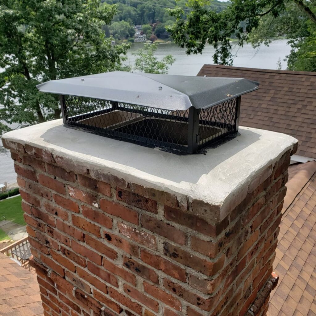 A new chimney cap installed to prevent wildlife entry, a service by Serene Property Services LLC in Albany, NY