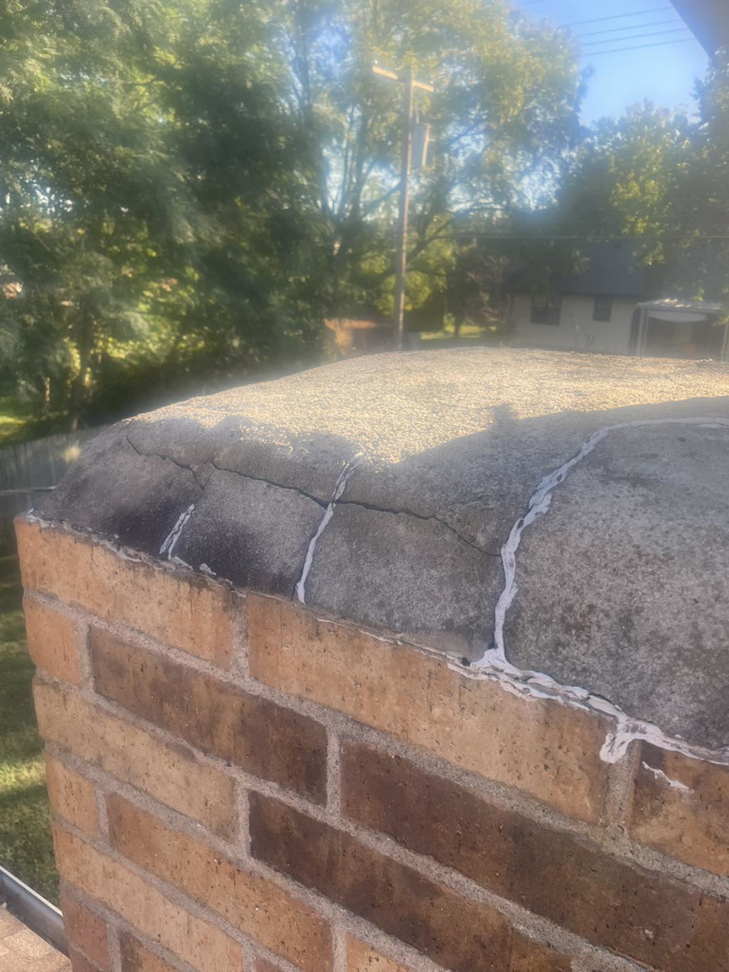 Close-up of a chimney crown repair with sealant applied by Chimney Cricket Cleaning Service in Marshfield, MO