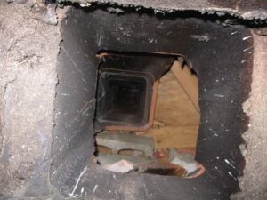 An internal view of a chimney flue, showing the structure and potential areas for inspection or repair by A Step Above Chimney & Siding in Wichita, KS.