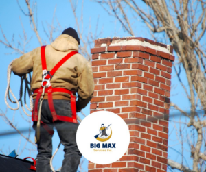 A chimney sweep technician on a roof with a safety harness, preparing to work on a chimney for Big Max Services Inc in Los Angeles, CA.