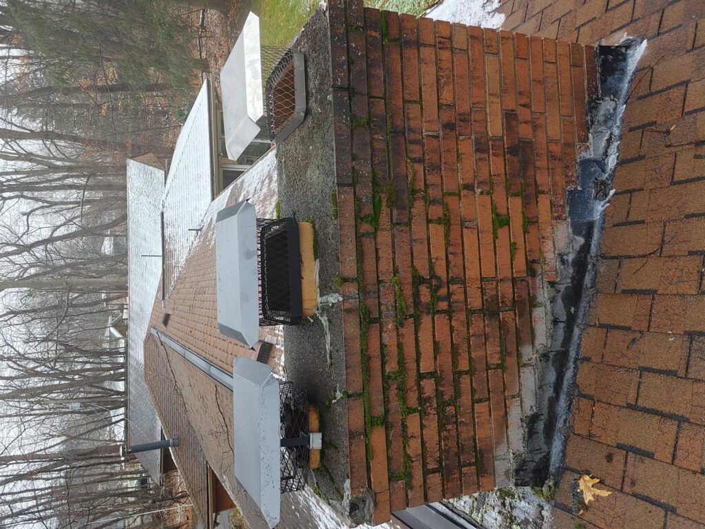 Chimney caps installed to prevent wildlife entry as part of exclusion services by Pest Express LLC in Rochester, NY
