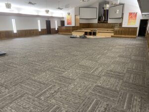 A large church hall featuring new carpet tile installation by Carpet Direct Brandon Burley in Muskogee, OK