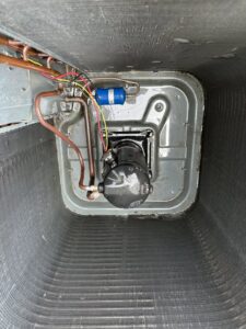 A clean air conditioning compressor unit after an HVAC service by Nacho Heating & Cooling Plus Co. in Crest Hill, IL