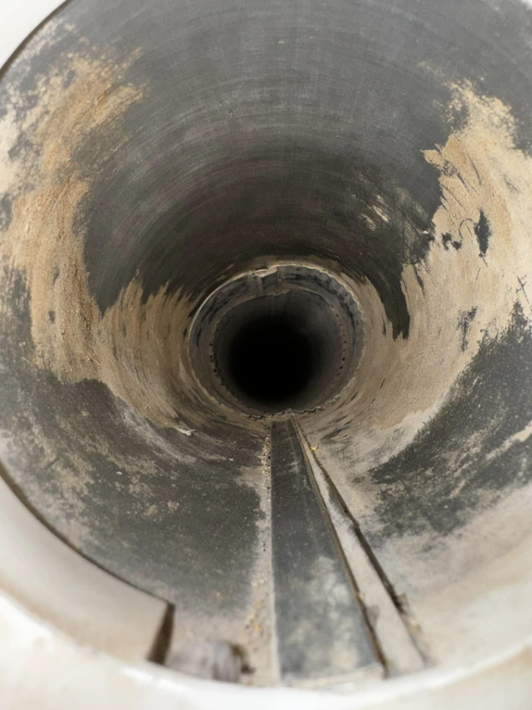 A view inside a clean air duct, showing professional duct inspection by Air Ducts Heating & Air in Dayton, OH.