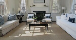A clean, light-colored area rug in a beautifully decorated living room, a result of Norris Carpet Care in Watertown, SD.