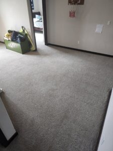 A clean bedroom carpet after professional service by Clean-Master in Coeur d'Alene, ID.