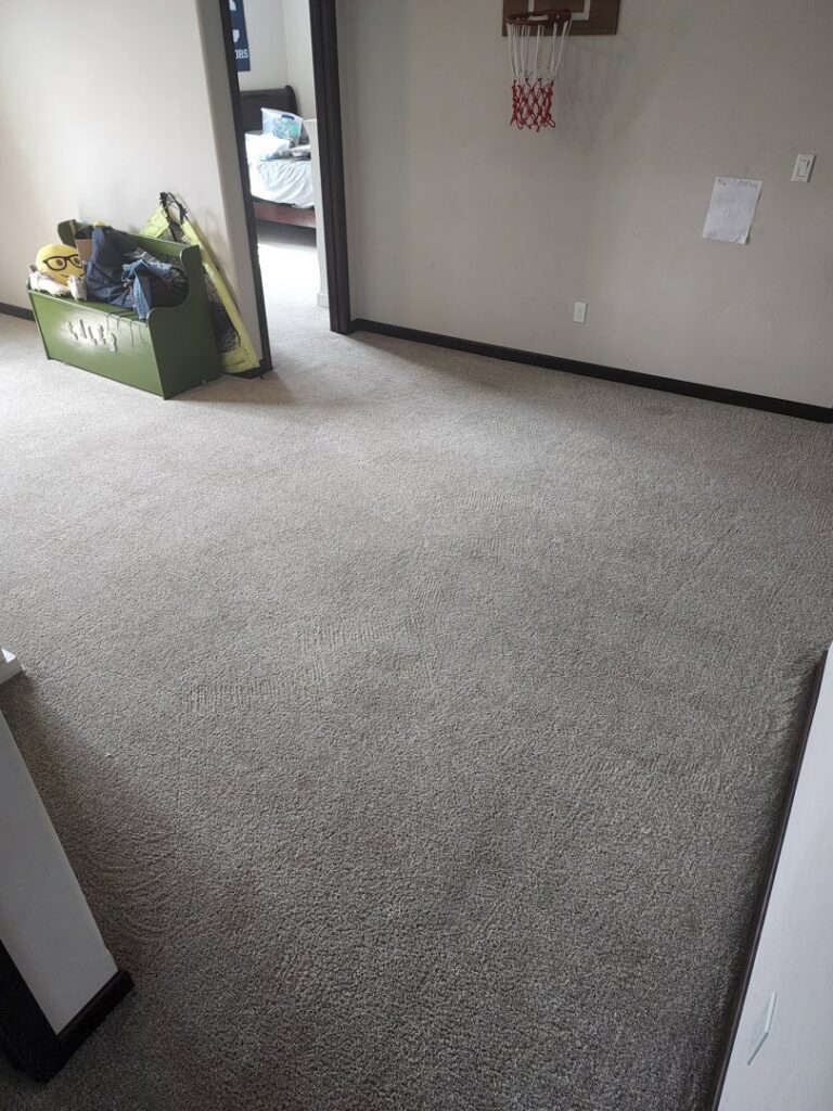 A clean bedroom carpet after professional service by Clean-Master in Coeur d'Alene, ID.