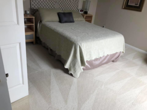 Clean bedroom carpet with distinct cleaning patterns from Cleaning Service Pro, LLC in Peoria, AZ