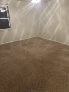 A clean brown carpet in a room, demonstrating the quality of Safe-Dry Carpet Cleaning of Clarksville, TN