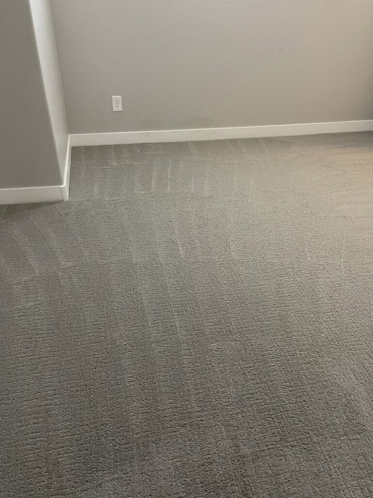 A freshly cleaned carpet in a bedroom after service by Arizona Steamers Carpet Care in Phoenix, AZ.
