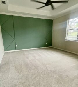 A clean, light-colored carpet in a bedroom, showing fresh vacuum lines, by The Best Carpet & Tile Cleaners in Alva, FL.