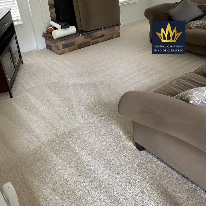 Freshly cleaned carpet in a bright living room by Central California King of Clean LLC in Bakersfield, CA.