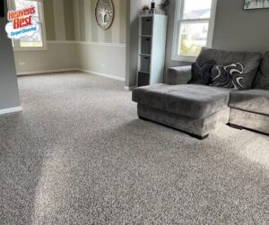 A freshly cleaned, light-colored carpet in a living room by Heaven's Best Carpet Cleaning in Oklahoma City, OK.