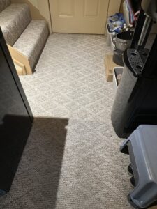 A clean carpeted hallway and stairs with visible cleaning lines by Fiber Dry Carpet & Upholstery Cleaning in Dayton, OH.