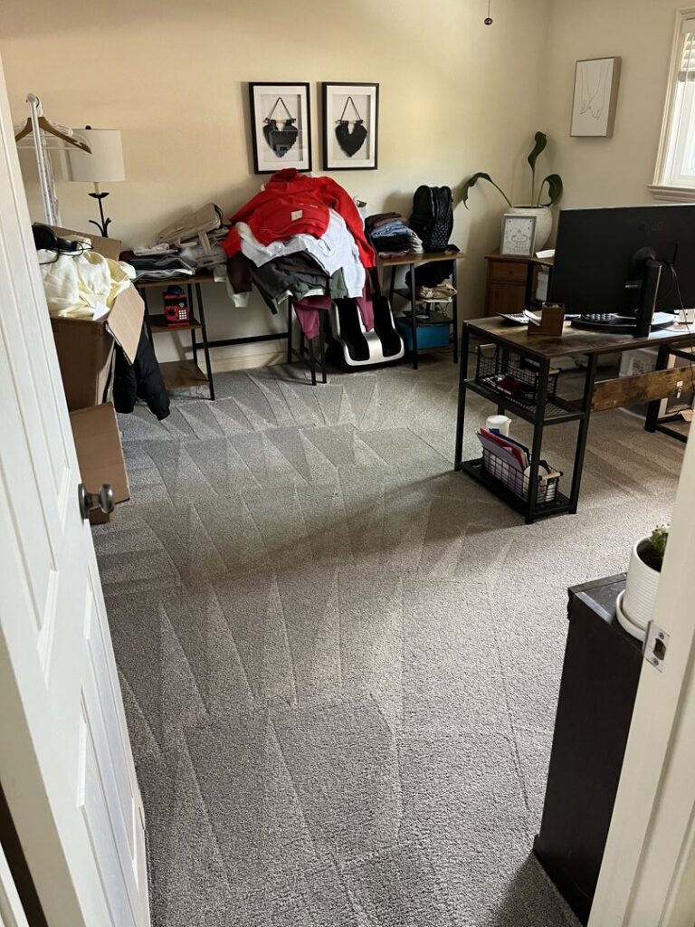 A freshly cleaned carpeted office room with distinct vacuum lines by Soap & Steam Carpet Cleaning in Raleigh, NC