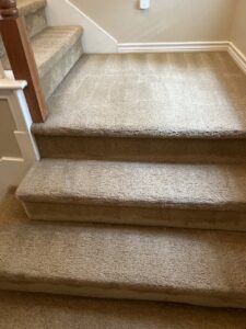A clean, well-maintained carpeted staircase after professional service by All-Star Carpet Cleaning in Dallas, TX.