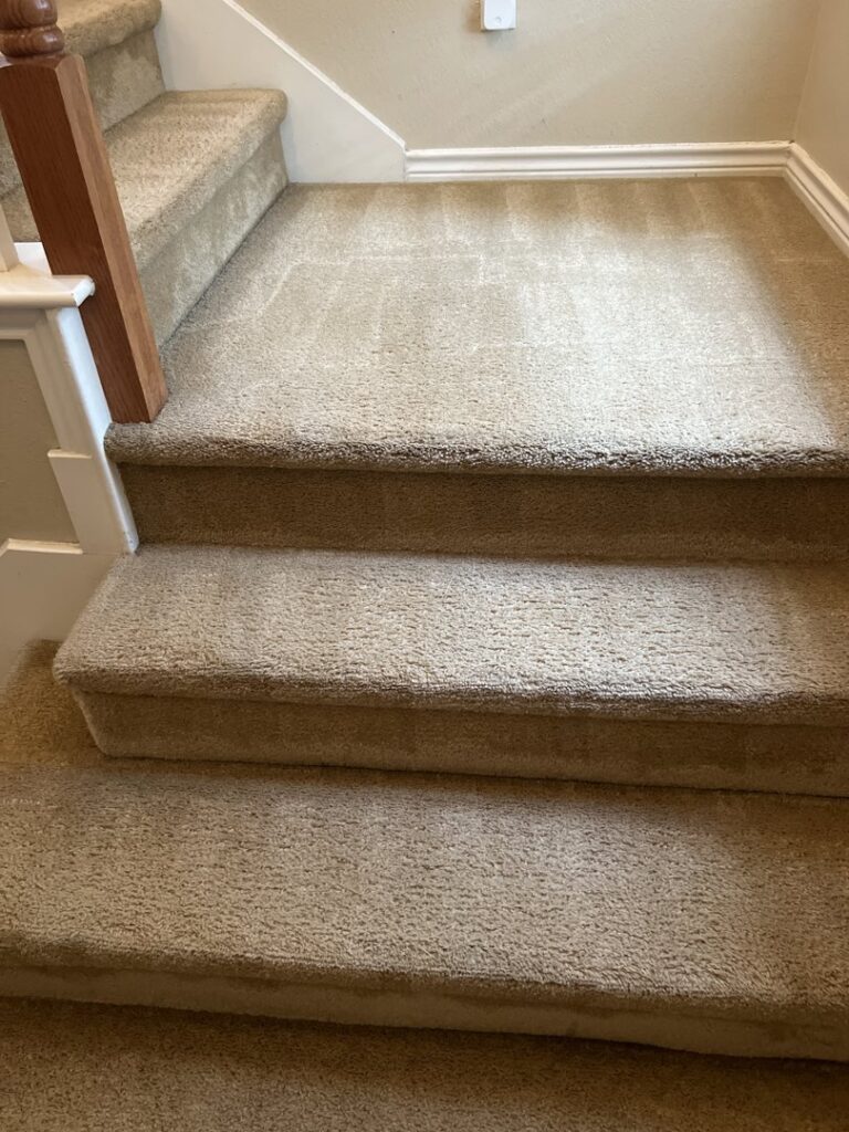 A clean, well-maintained carpeted staircase after professional service by All-Star Carpet Cleaning in Dallas, TX.