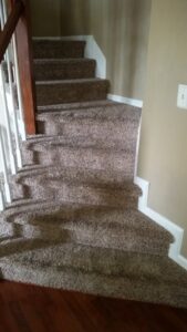 Clean carpeted stairs after a professional cleaning service by BareFoot Clean, Inc. in Virginia Beach, VA.