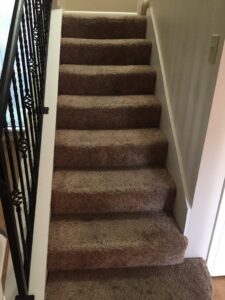 Clean, well-maintained carpeted stairs, showcasing the work of City Carpet Cleaners 1 in Houston, TX
