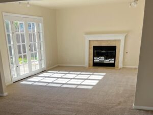 A clean, empty carpeted room after professional cleaning service by Orozco's Janitorial Services LLC in Escondido, CA.