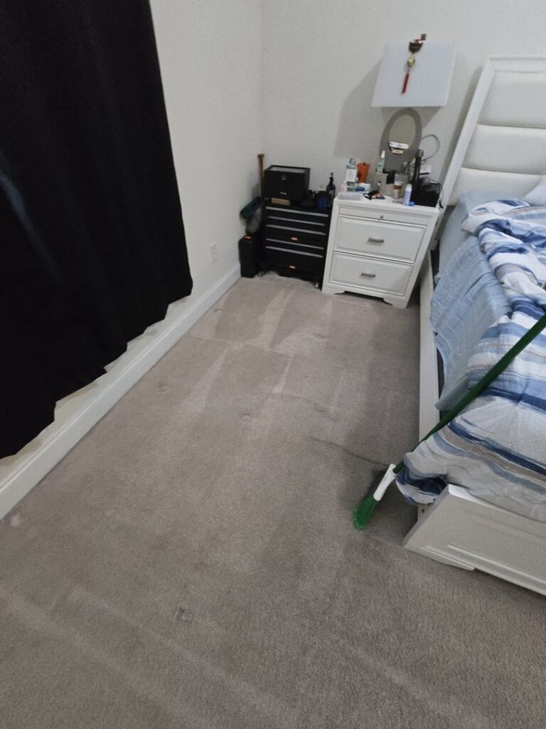 A clean gray carpet in a bedroom showing distinct cleaning lines from Zerorez Columbia in Columbia, SC.