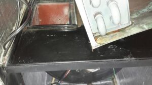 A clean HVAC coil and drain pan after service by Purair Hawaii in Honolulu, HI.