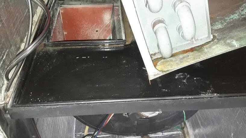 A clean HVAC coil and drain pan after service by Purair Hawaii in Honolulu, HI.