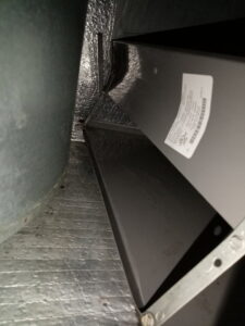 A clean interior view of an HVAC plenum or duct, showcasing quality work by AirHero.Pro in Lafayette, LA.