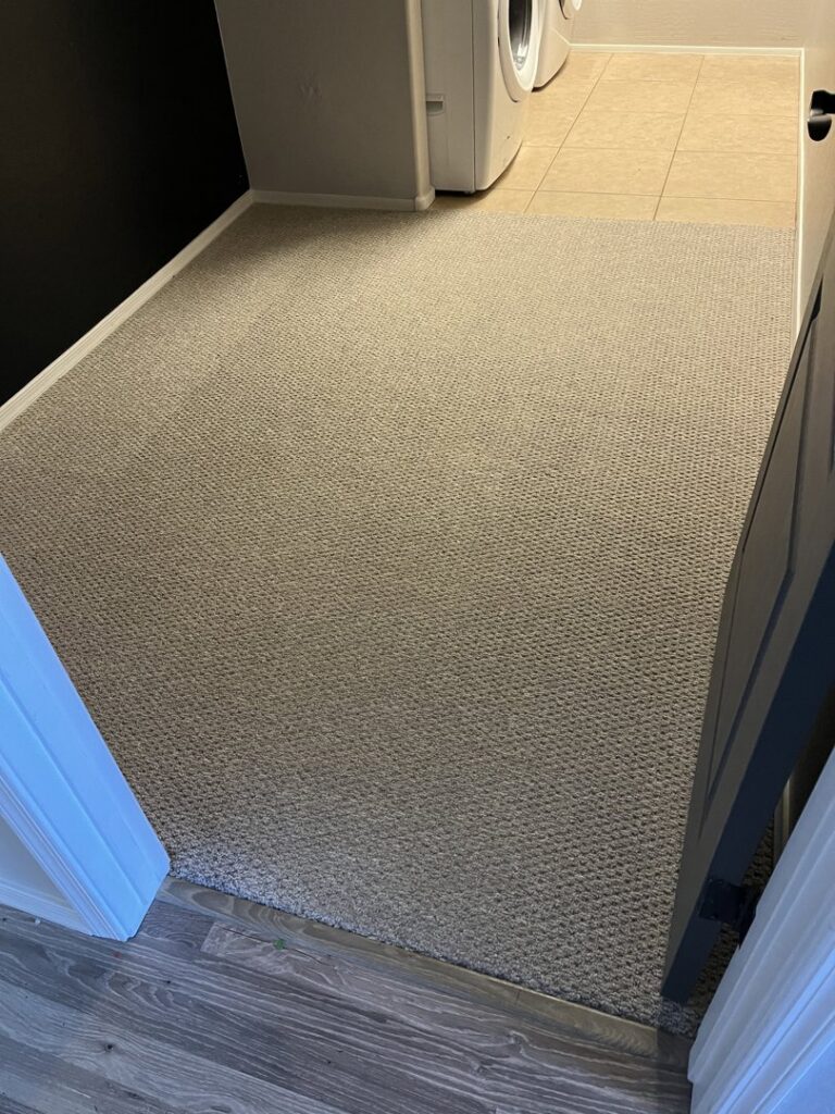 A clean carpet in a laundry room after service by Healthy Living Carpet & Tile Cleaning in Peoria, AZ.