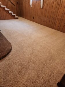 A clean light brown carpet in a living room after professional cleaning by Heaven's Best Carpet Cleaning Idaho Falls ID.