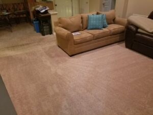 A clean living room carpet with subtle cleaning patterns after service by Affordable carpet cleaning CO LLC in Montgomery, AL.
