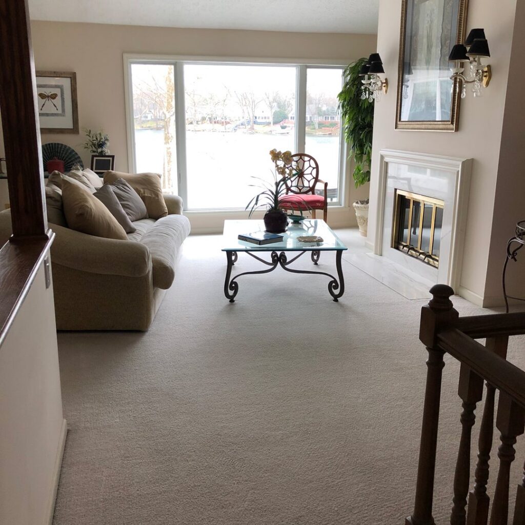 A beautifully cleaned, light-colored carpet in a residential living room by Eco Carpet Cleaning in Indianapolis, IN.