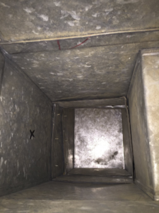 A clean metal air duct after professional service by Richmond Restoration in Worcester, MA