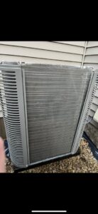 Clean coils of an outdoor air conditioning unit after service by Holzer Heating And Cooling in Savage, MN