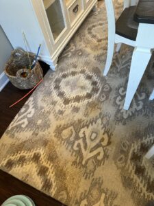A clean, patterned area rug in a dining room, showcasing the excellent results from K&T Chem-Dry in New Lenox, IL.
