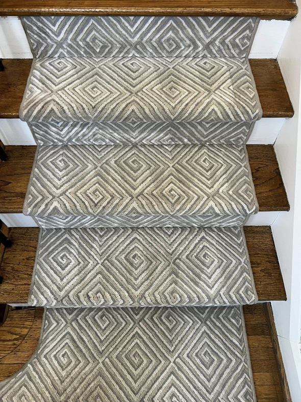 Clean patterned carpet on stairs after service by Roberts Cleaning Services in Zionsville, IN.