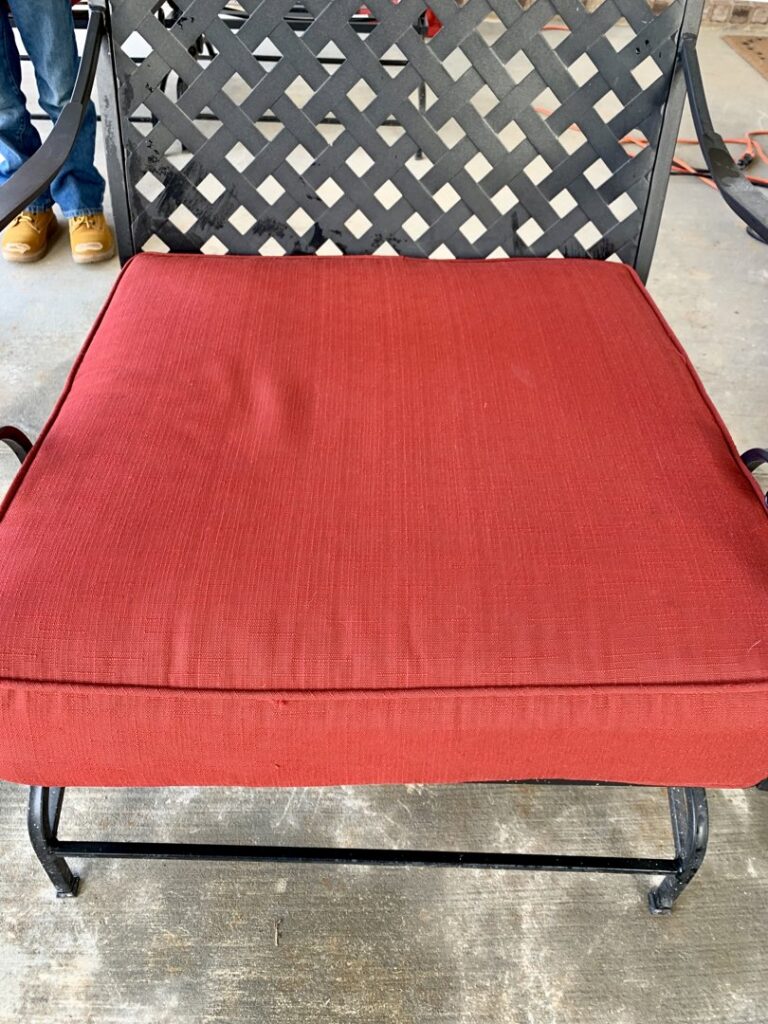 A clean red chair cushion after professional upholstery cleaning by Magic Clean Plus in Ann Arbor, MI.